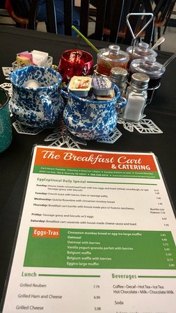 The breakfast cart's menu on a table. 