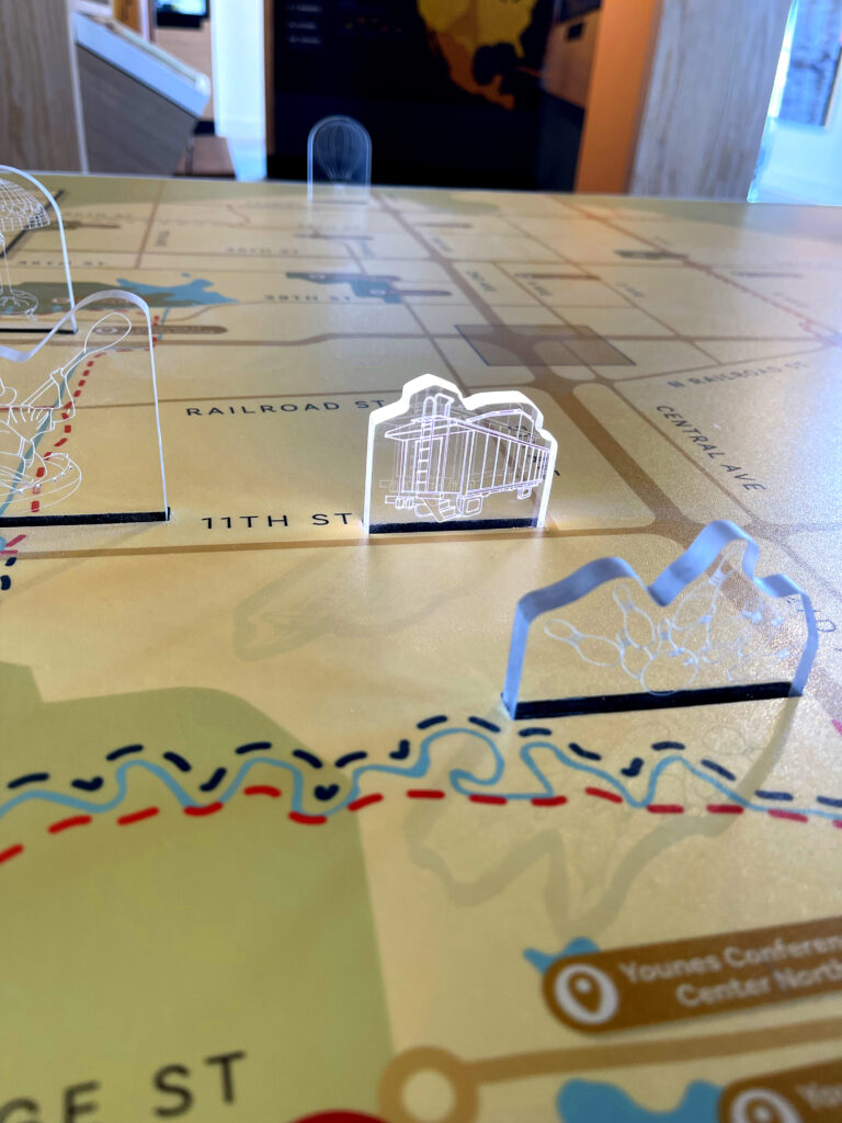 display table of Kearney with light up drawings of different buildings and tourist stops. 