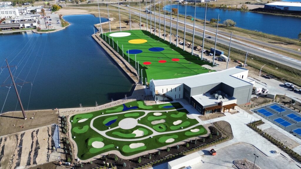 aerial view of the Drop Zone beside the lake, displaying outdoor putting golf course. 