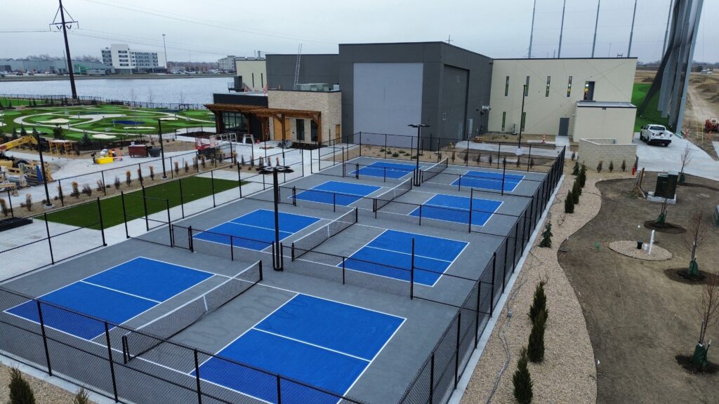 outdoor pickle ball courts in front of drop zone building