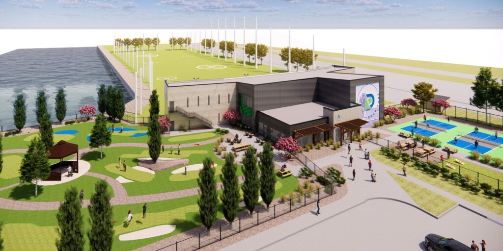 aerial view of drop zone building with golfing greens and pickleball courts. 