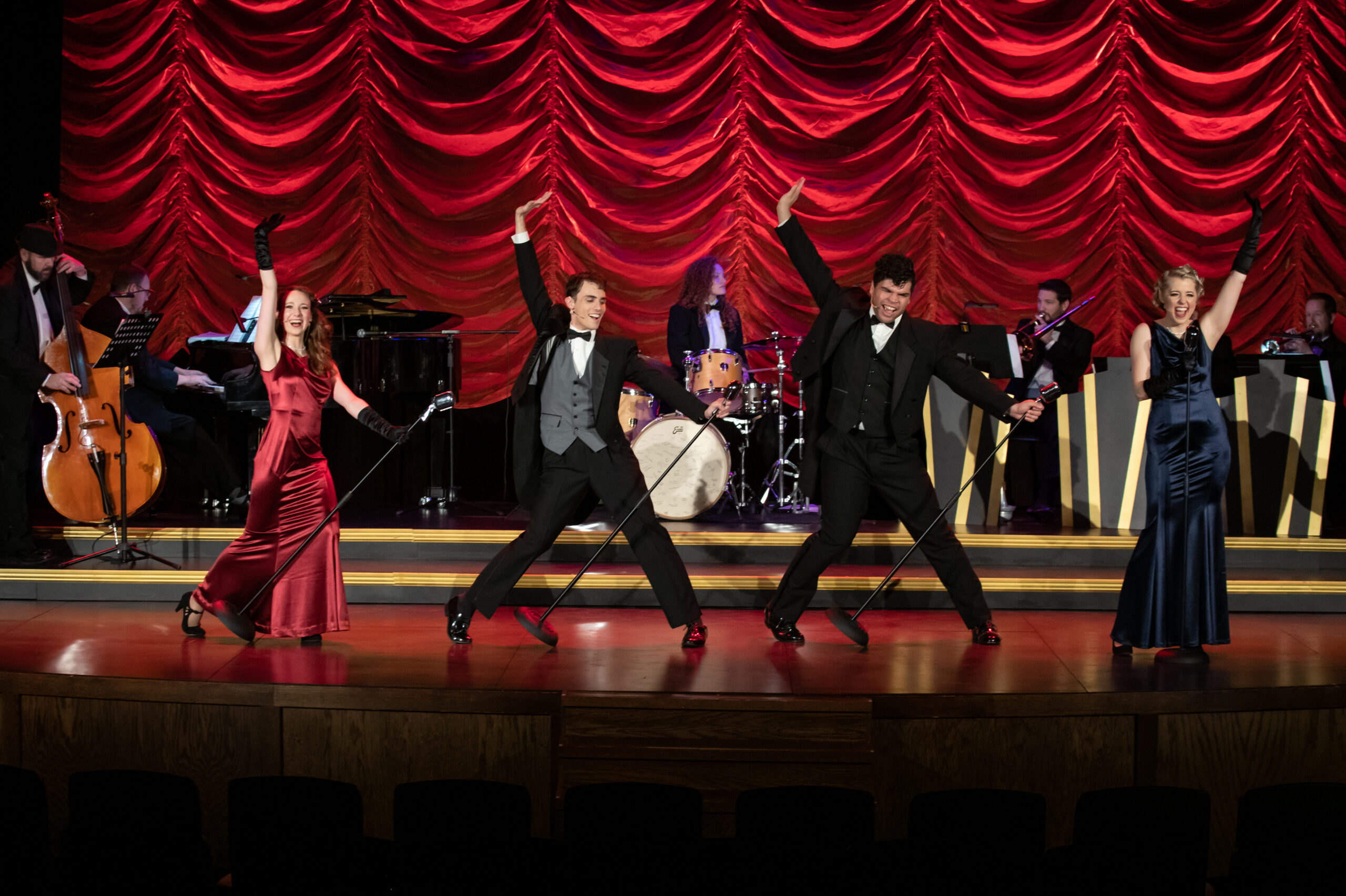 Actors perform on stage during Crane River Theater’s Celebrate Broadway production